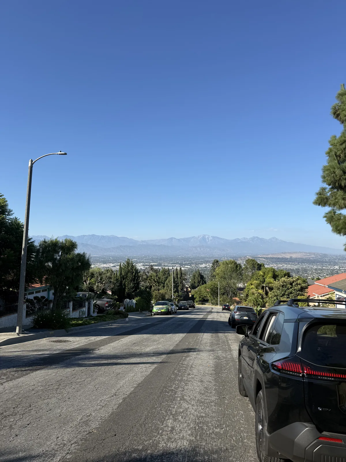 Private transportation vehicle overlooking the Los Angeles area